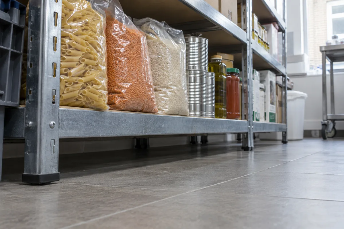 Accessible space beneath dry-goods shelves